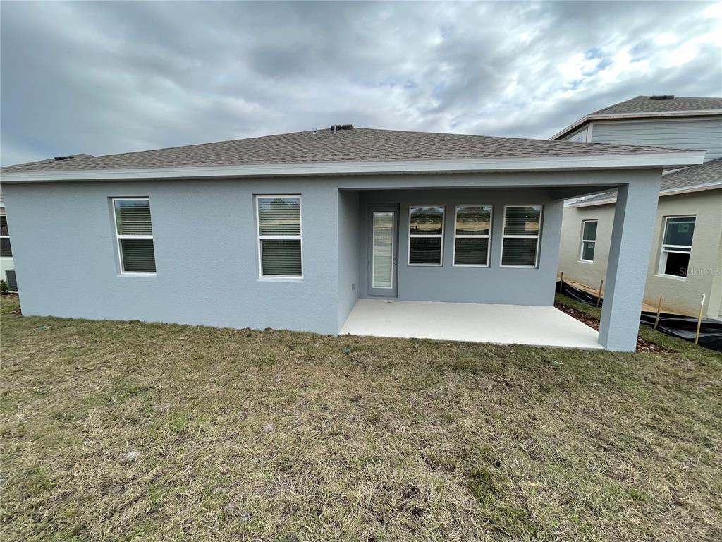 2623 Runners Circle Clermont, FL 34714 - Photo 21 of 21 a front view of house with yard