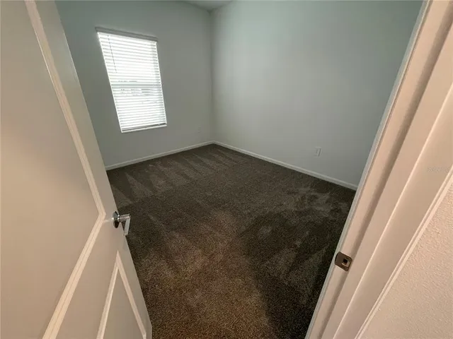 an entryway door with a window