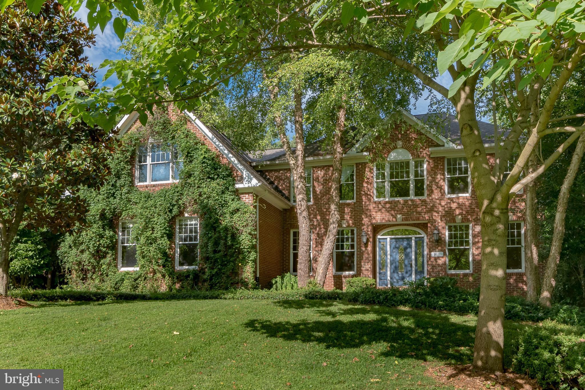 3111 Hunt Road Oakton, VA 22124 - Photo 1 of 30 Brick Front Estate with 3-car side load garage