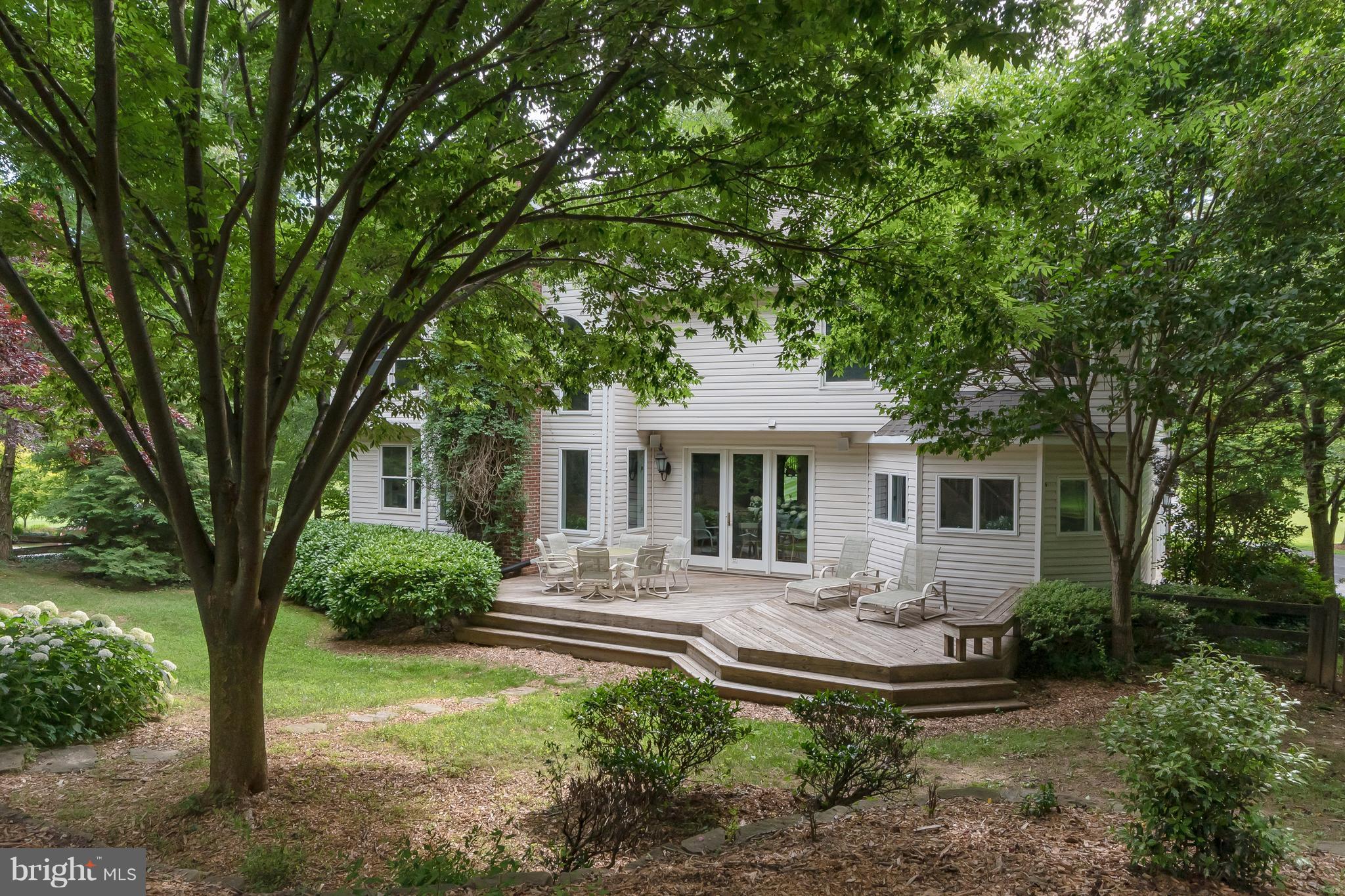 3111 Hunt Road Oakton, VA 22124 - Photo 8 of 30 Large, Fenced Backyard w/ stone retaining wall