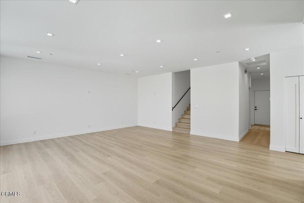 1907 Ocean Avenue Ventura, CA 93001 - Photo 20 of 51 a view of an empty room with wooden floor