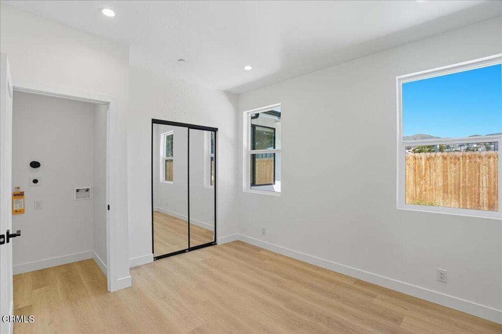 1907 Ocean Avenue Ventura, CA 93001 - Photo 38 of 51 an empty room with windows