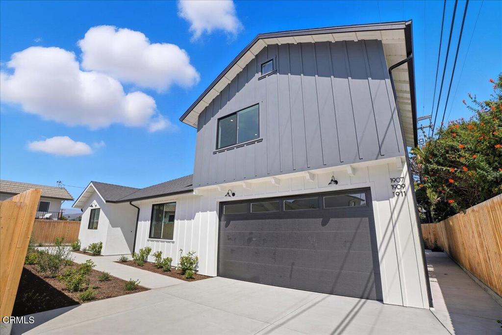 1907 Ocean Avenue Ventura, CA 93001 - Photo 4 of 51 a front view of a house with a garage