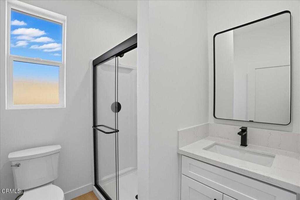 1907 Ocean Avenue Ventura, CA 93001 - Photo 43 of 51 a bathroom with a shower a toilet and sink