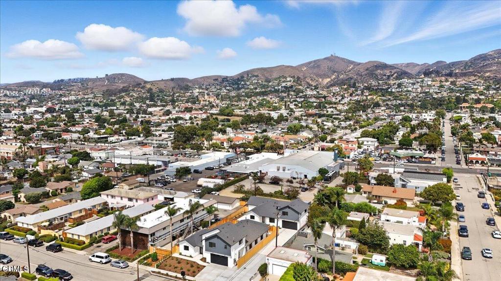 1907 Ocean Avenue Ventura, CA 93001 - Photo 9 of 51 an aerial view of residential houses with outdoor space and trees