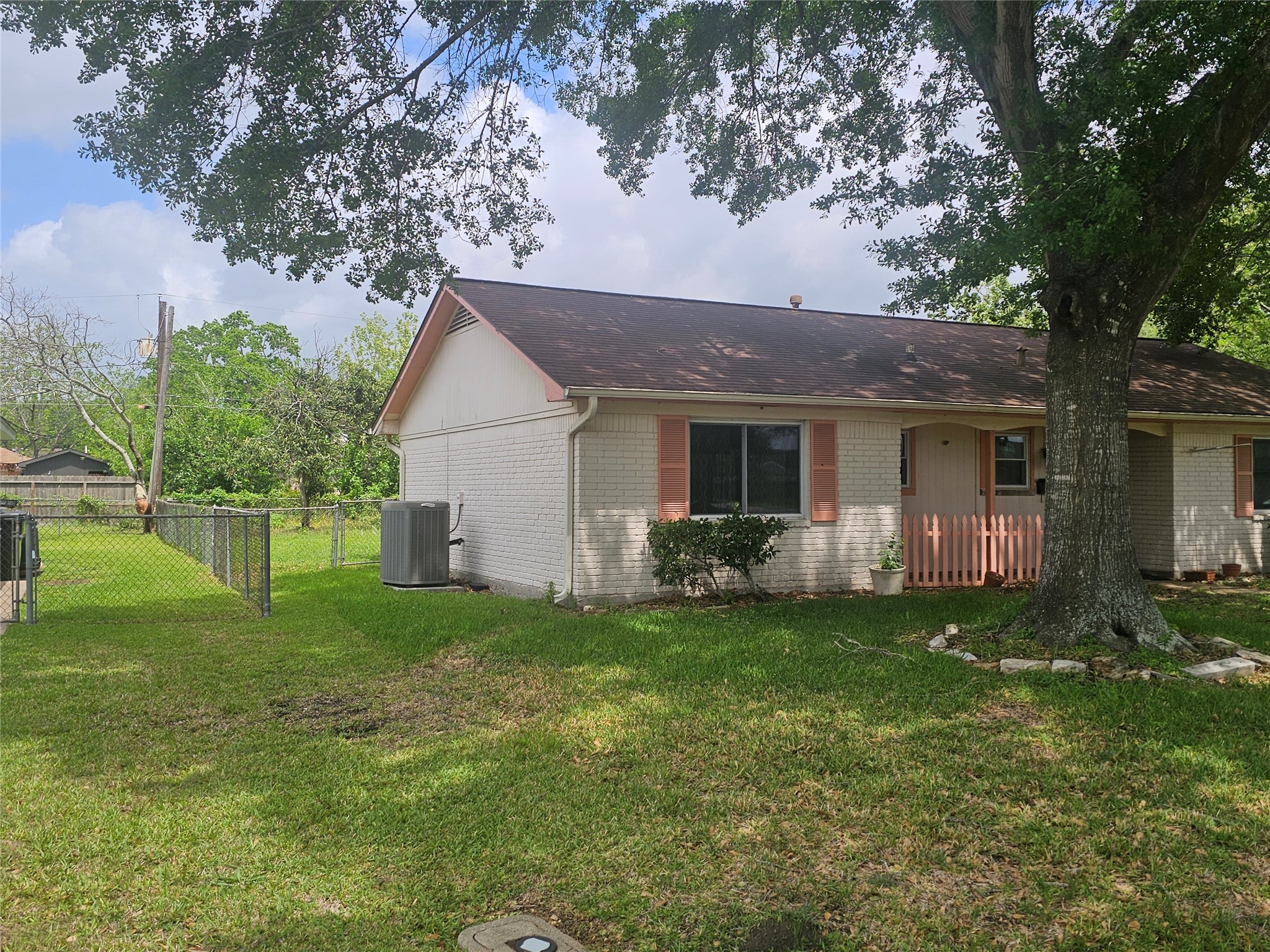 1802 Junker Street Rosenberg, TX 77471 - Photo 2 of 13 a front view of house with yard and green space