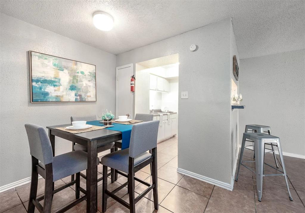 4300 Shaver Street, Unit 11 Houston, TX 77034 - Photo 5 of 8 a view of a dining room with furniture
