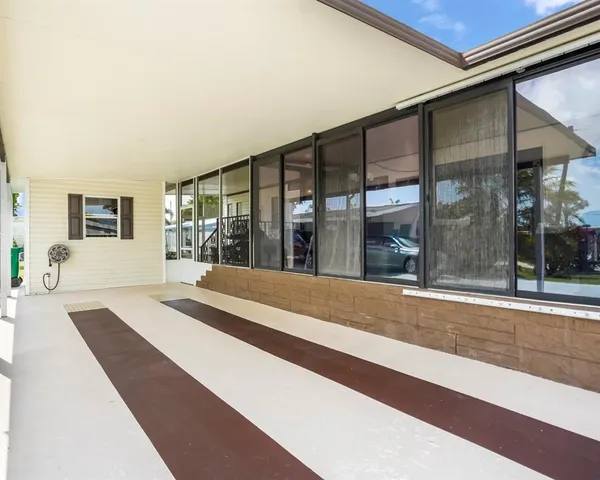 a view of a house with a porch