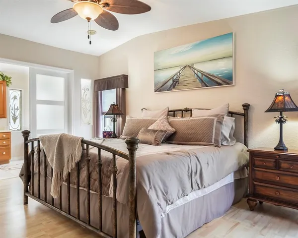 a bathroom with a double vanity sink a mirror and a shower