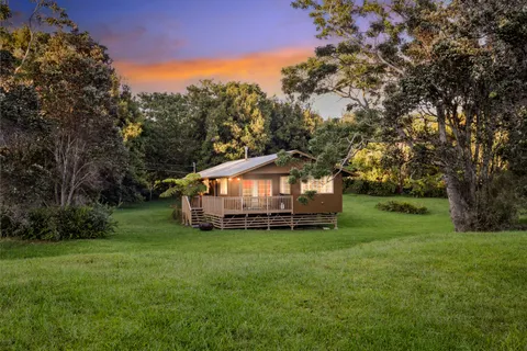 a view of a house with a big yard