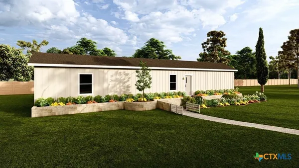 a view front of house with backyard and garden