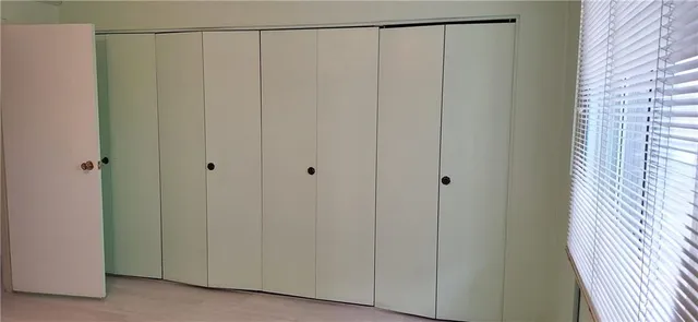 a bathroom with a shower and a toilet