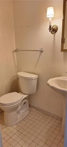 a bathroom with a sink and a toilet