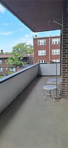 a lobby with furniture and a rug