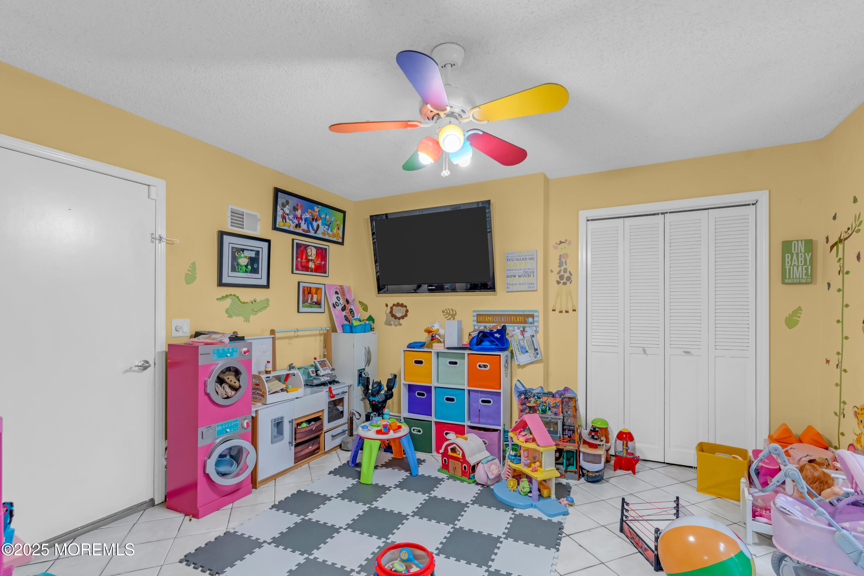 581 Winding River Road Brick, NJ 08724 - Photo 30 of 91 a room with toys and a couch