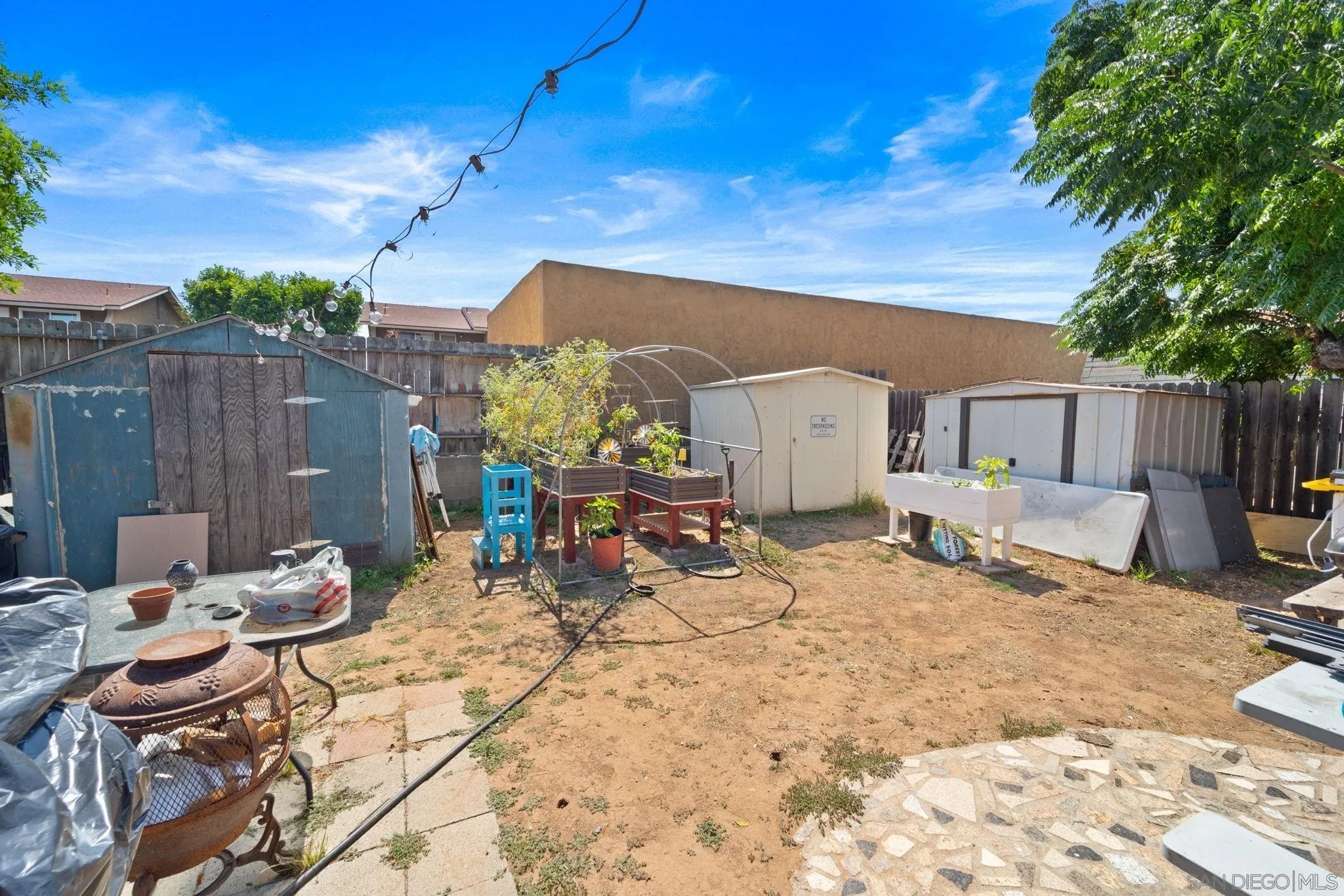 345 Cedar Street El Cajon, CA 92021 - Photo 16 of 19 a view of a dinning table and chairs in the patio