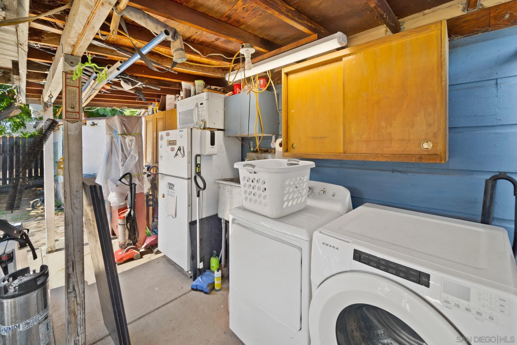 345 Cedar Street El Cajon, CA 92021 - Photo 19 of 19 a utility room with dryer and washer