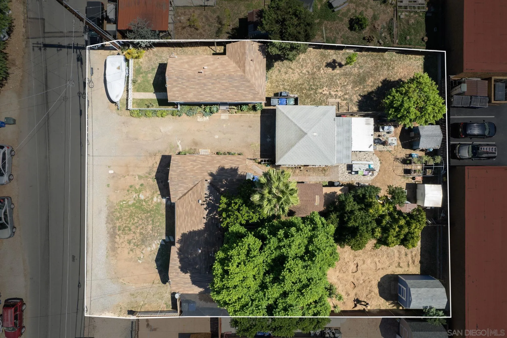 345 Cedar Street El Cajon, CA 92021 - Photo 3 of 19 an aerial view of residential houses with outdoor space