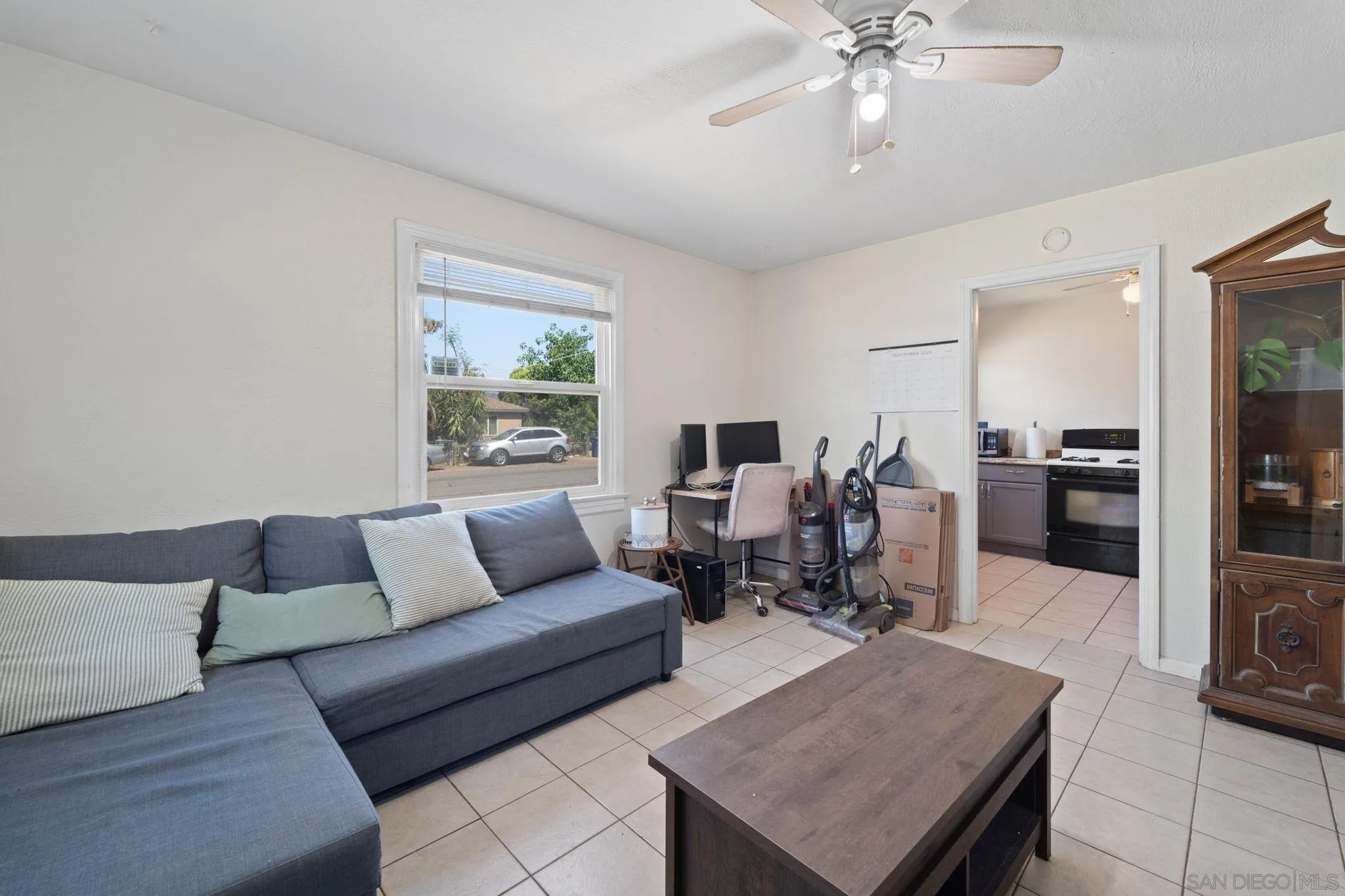 345 Cedar Street El Cajon, CA 92021 - Photo 8 of 19 a living room with furniture and view of kitchen