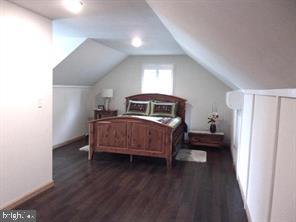 28880 Hudson Road Dagsboro, DE 19939 - Photo 21 of 29 a bedroom with a bed and a window