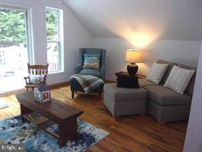 28880 Hudson Road Dagsboro, DE 19939 - Photo 24 of 29 a living room with furniture and a large window