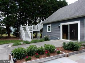 28880 Hudson Road Dagsboro, DE 19939 - Photo 25 of 29 a front view of a house with a garden