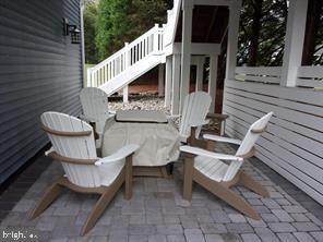 28880 Hudson Road Dagsboro, DE 19939 - Photo 27 of 29 a view of a chairs setting on the deck