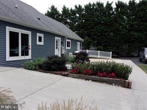 28880 Hudson Road Dagsboro, DE 19939 - Photo 28 of 29 a view of a garden with flowers
