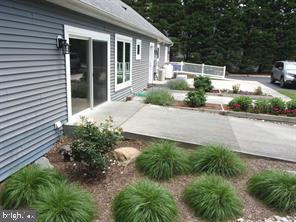 28880 Hudson Road Dagsboro, DE 19939 - Photo 29 of 29 a house that has a lot of plants in it