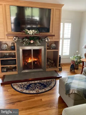 a living room with furniture or couch and a window