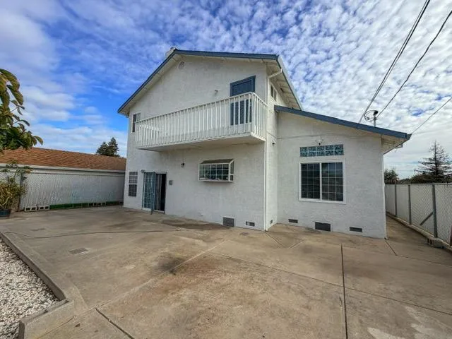 a view of house with an outdoor space