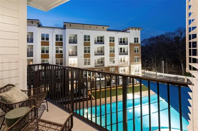 a view of a brick building from a balcony