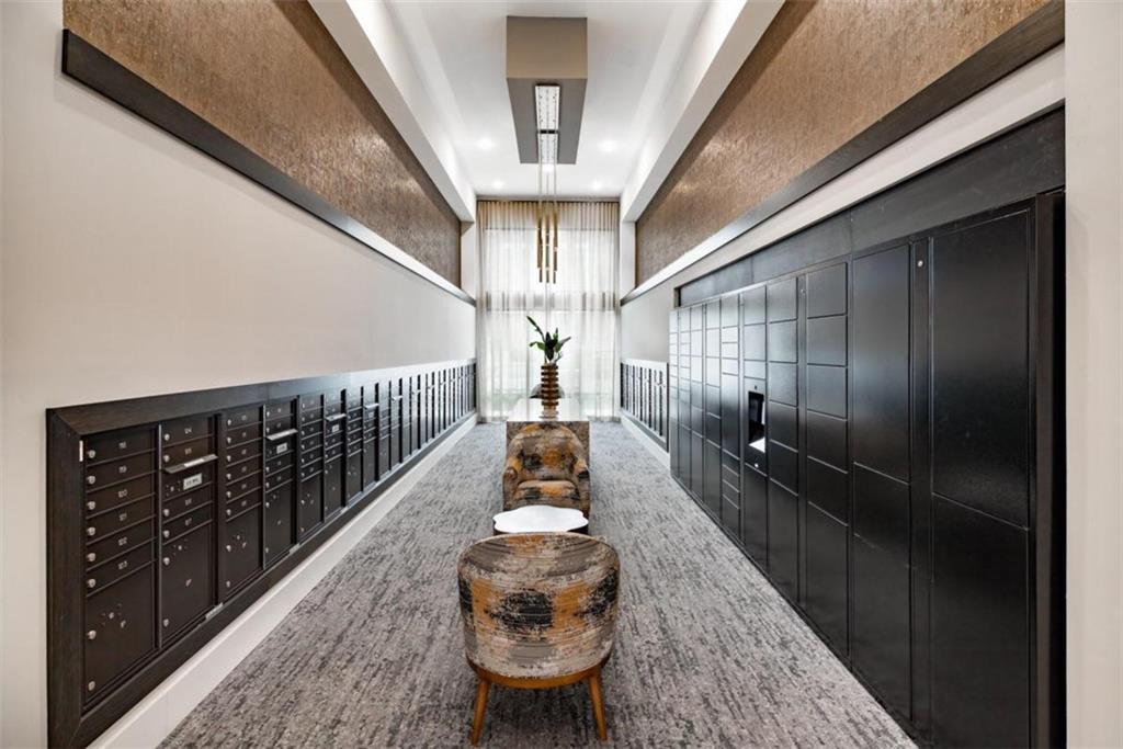 1927 Powers Ferry Road, Unit 522 Atlanta, GA 30339 - Photo 30 of 33 a view of entryway and hall with wooden floor