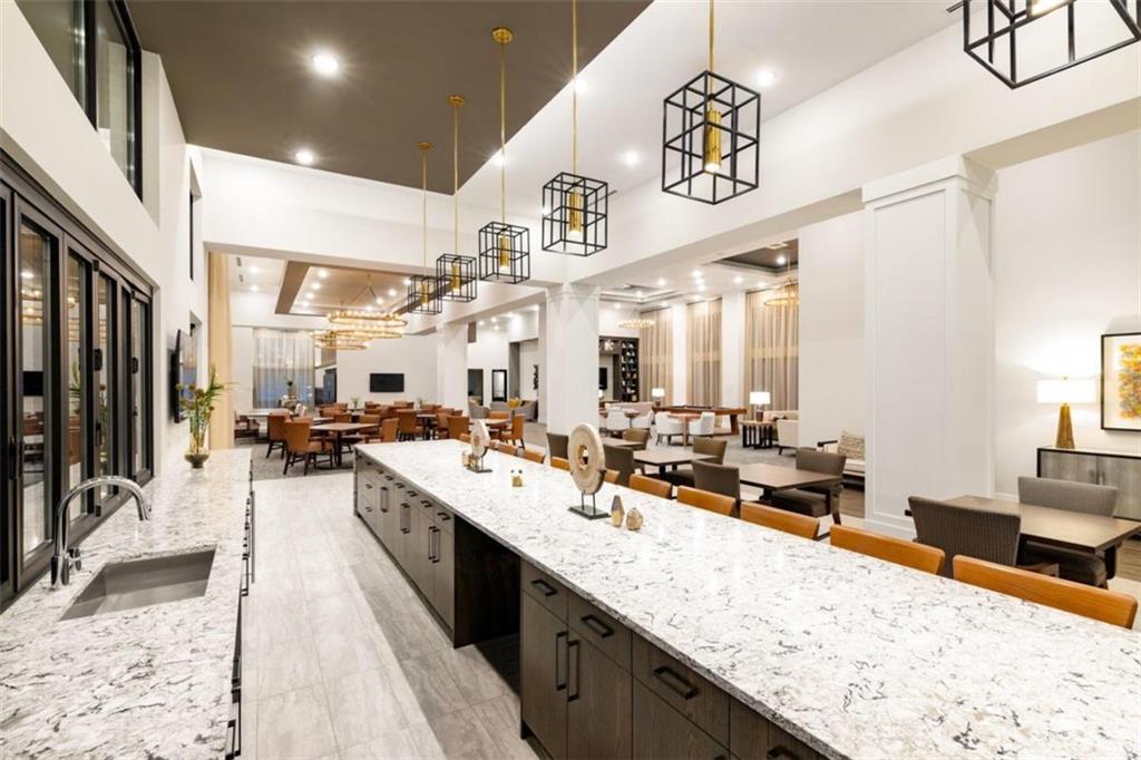 1927 Powers Ferry Road, Unit 522 Atlanta, GA 30339 - Photo 5 of 33 a large room with lots of counter space