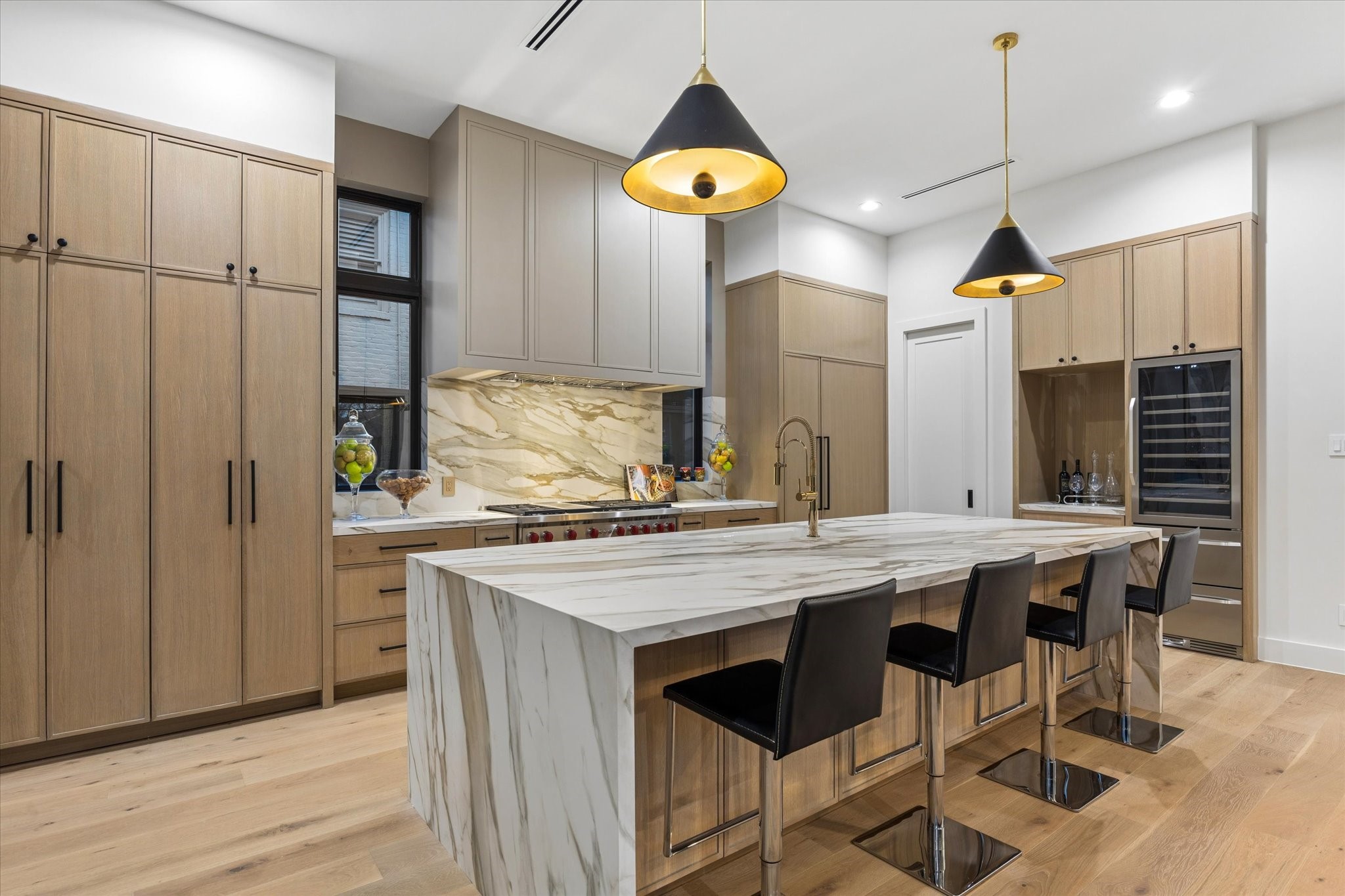 2102 Tangley Street Houston, TX 77005 - Photo 15 of 49 a kitchen with a table and chairs in it