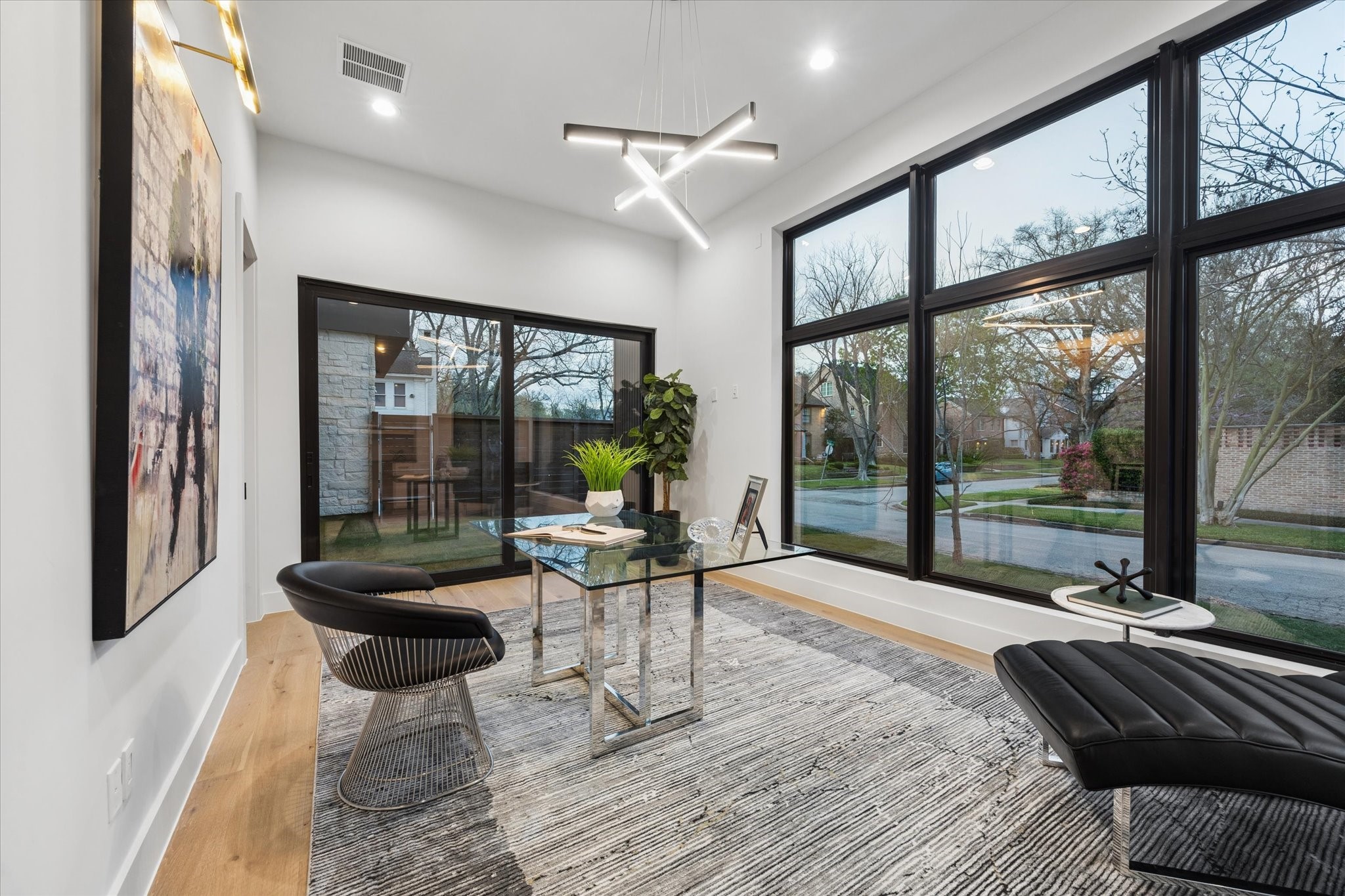 2102 Tangley Street Houston, TX 77005 - Photo 22 of 49 a living room with furniture and a large window with outer view