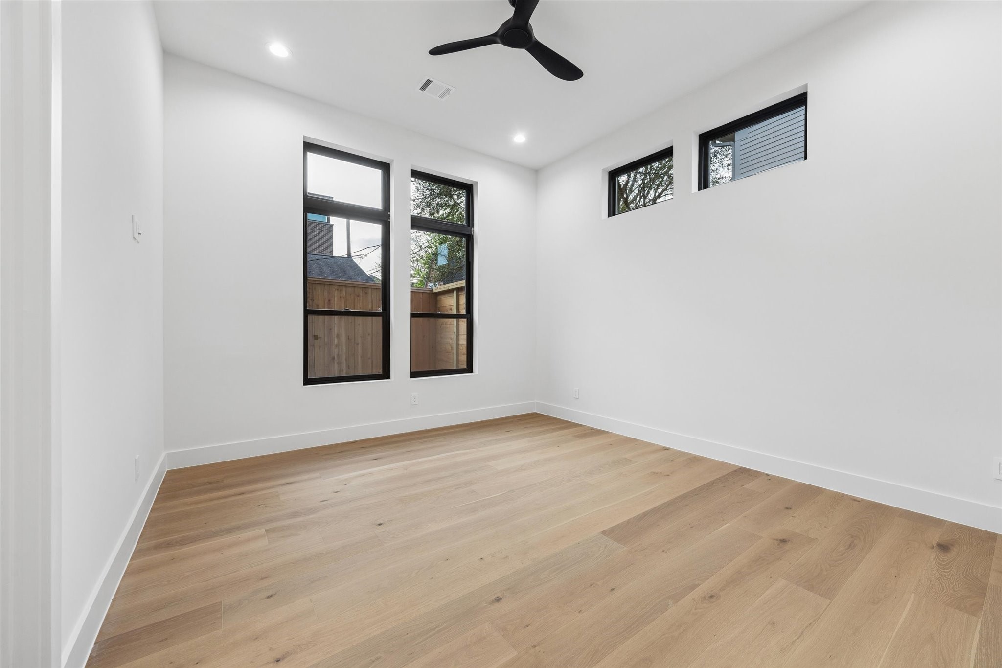 2102 Tangley Street Houston, TX 77005 - Photo 23 of 49 a view of an empty room with a window