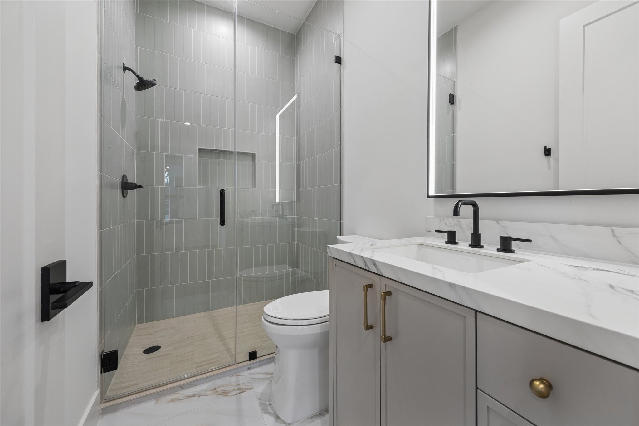 2102 Tangley Street Houston, TX 77005 - Photo 37 of 49 a bathroom with a sink a toilet and shower
