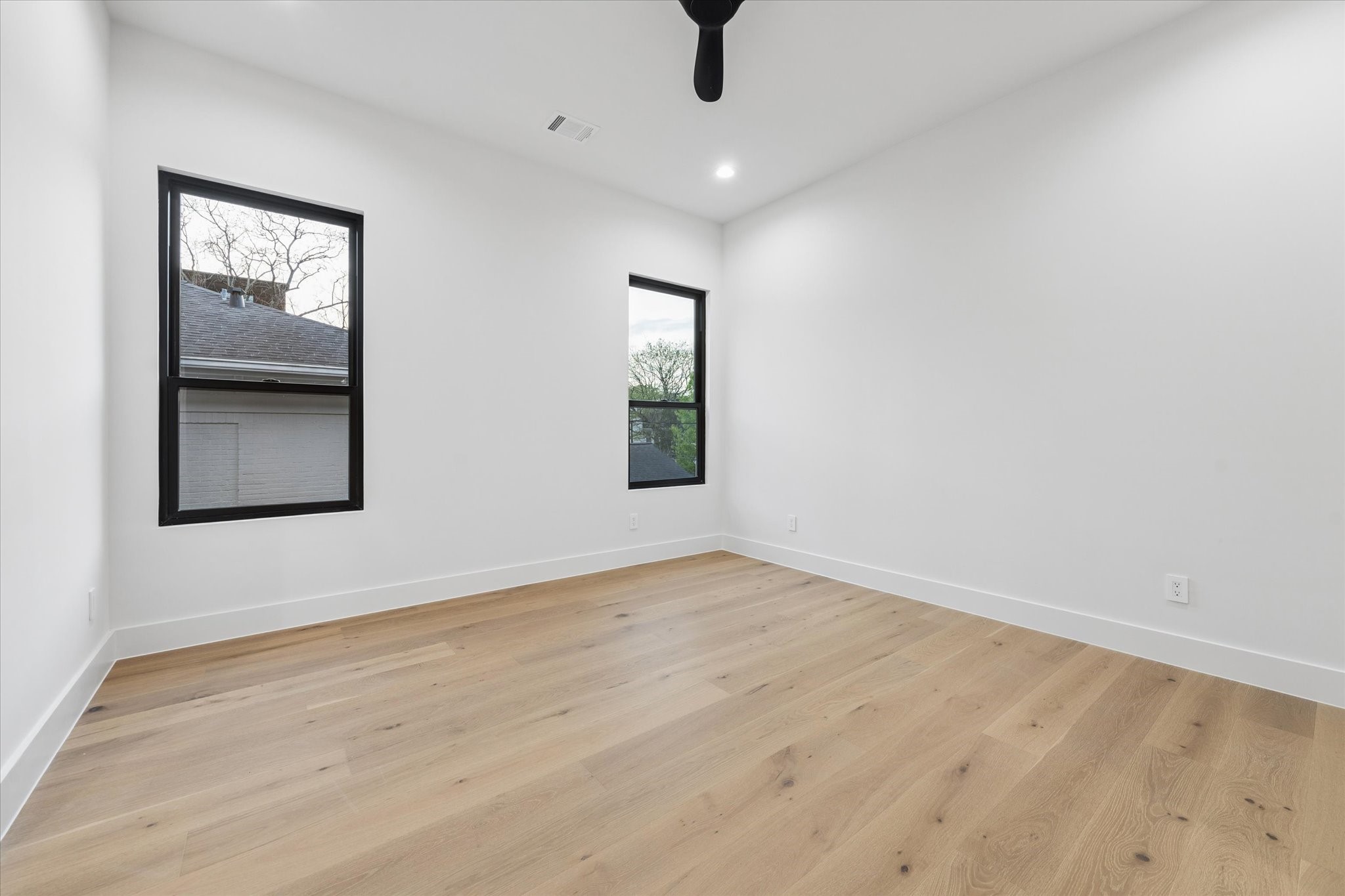 2102 Tangley Street Houston, TX 77005 - Photo 40 of 49 an empty room with windows