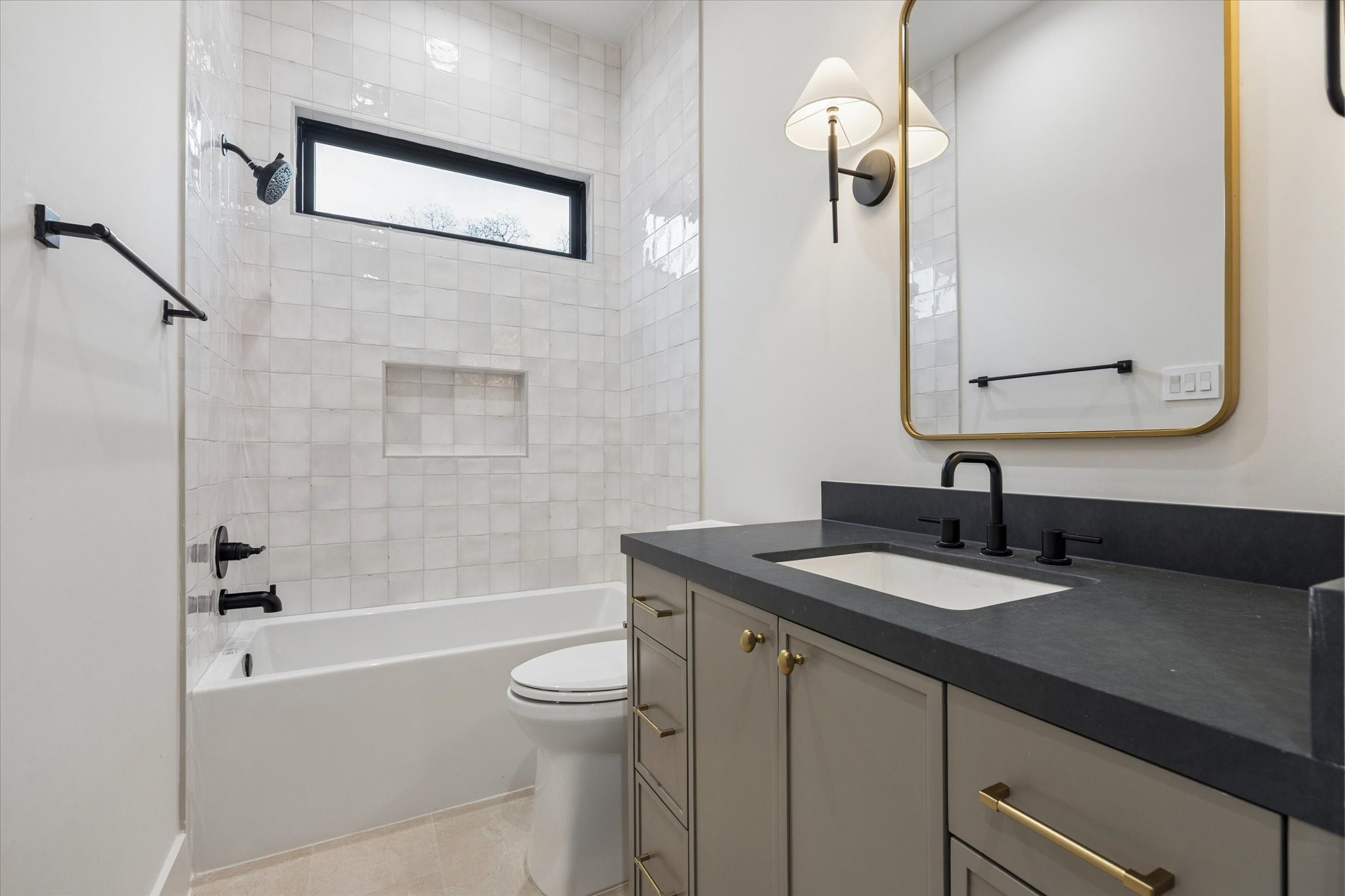 2102 Tangley Street Houston, TX 77005 - Photo 44 of 49 a bathroom with a granite countertop sink mirror toilet and bathtub