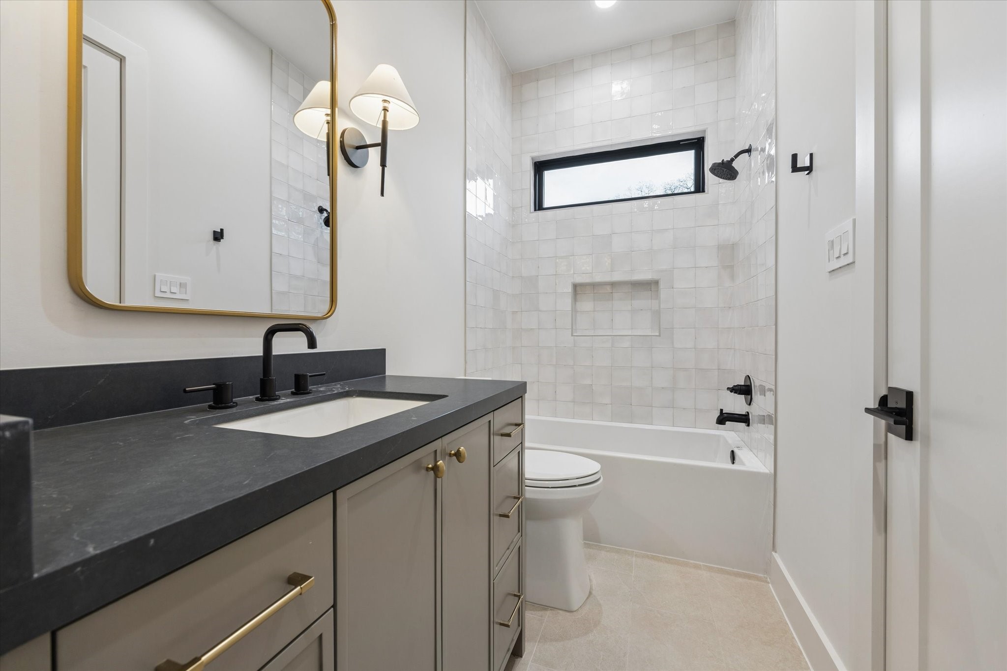 2102 Tangley Street Houston, TX 77005 - Photo 45 of 49 a bathroom with a granite countertop sink a toilet and shower