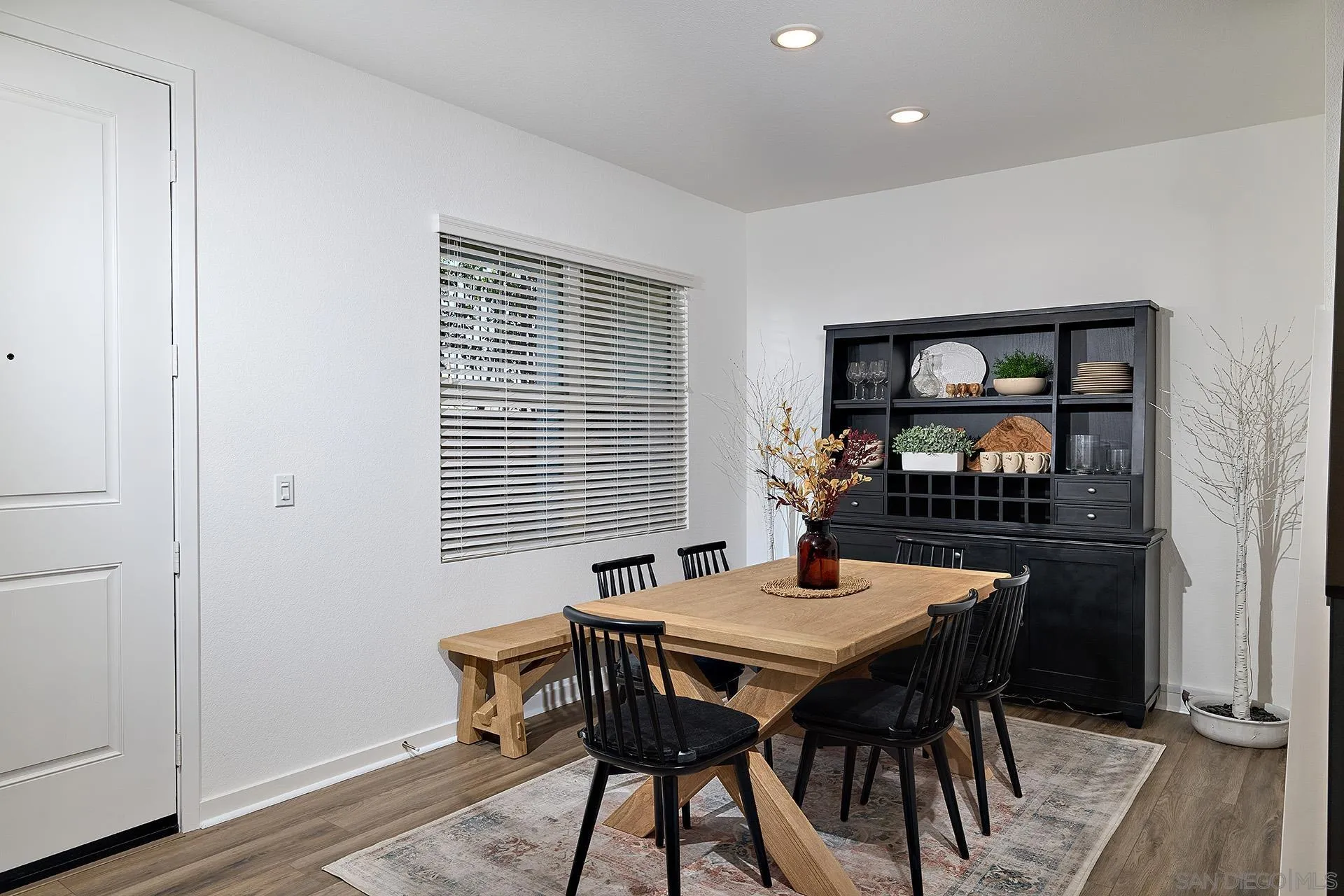 13070 Olympus Circle, Unit 1 Poway, CA 92064 - Photo 12 of 28 a view of a dining room with furniture window and wooden floor