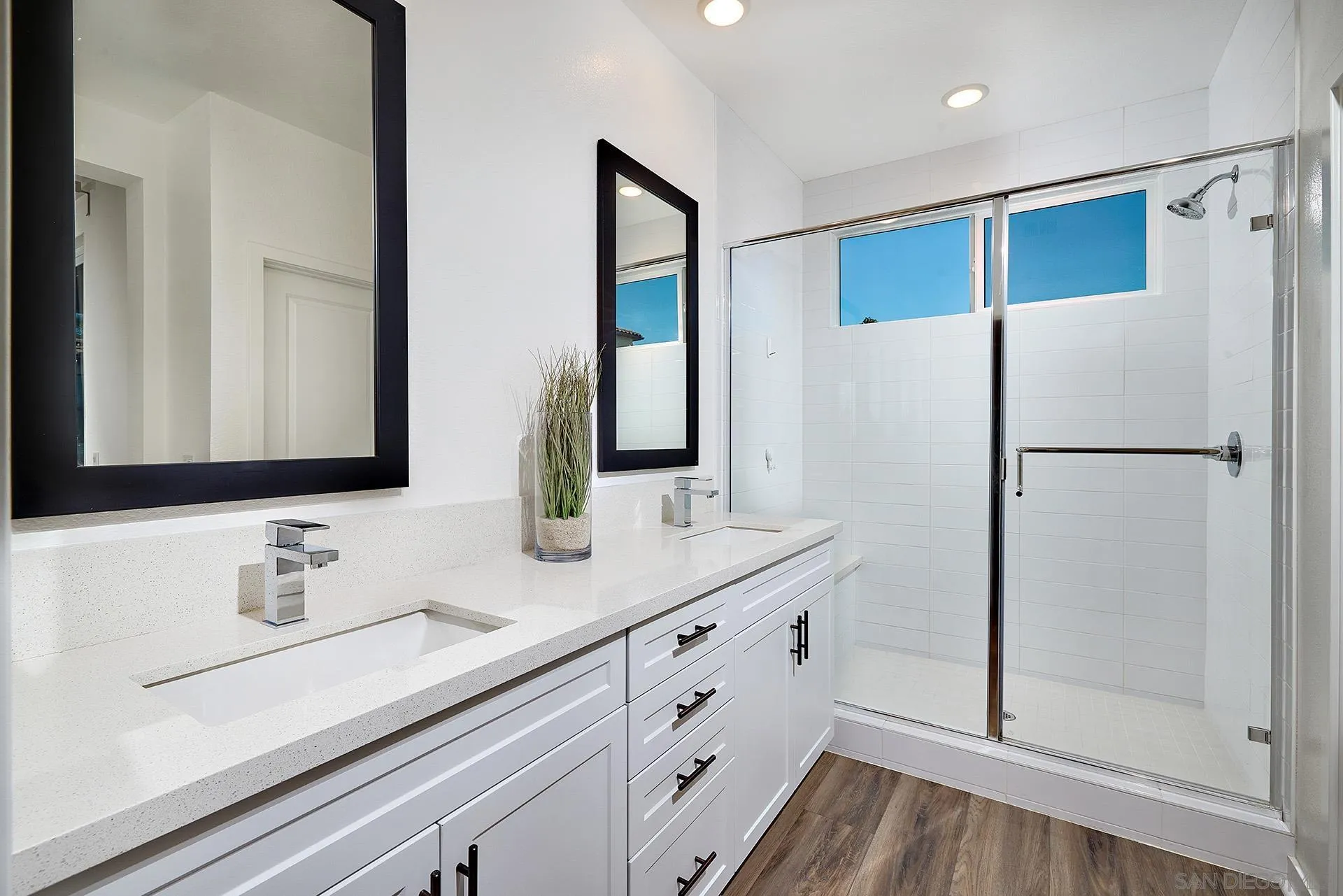 13070 Olympus Circle, Unit 1 Poway, CA 92064 - Photo 21 of 28 a bathroom with a double vanity sink mirror and double