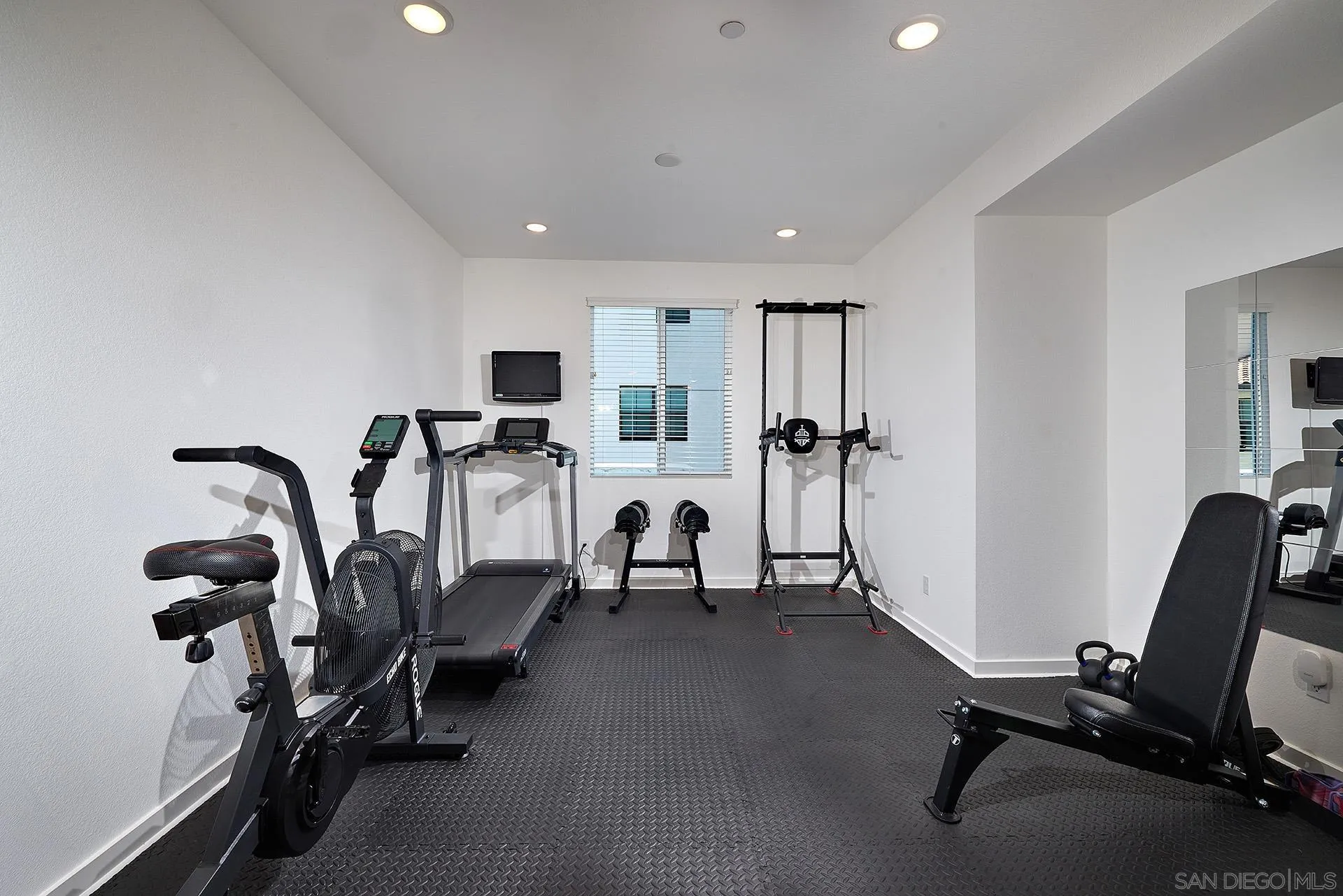 13070 Olympus Circle, Unit 1 Poway, CA 92064 - Photo 23 of 28 a view of a room with gym equipment