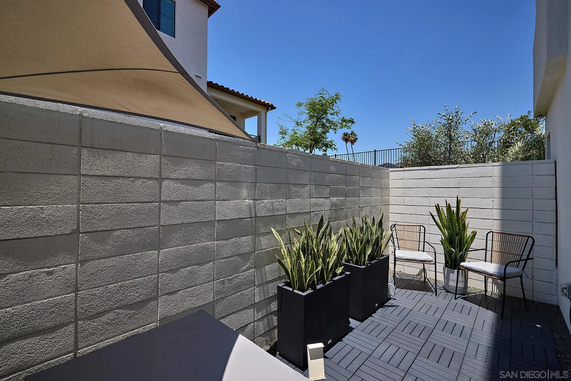 13070 Olympus Circle, Unit 1 Poway, CA 92064 - Photo 8 of 28 a view of a chairs and table in a patio