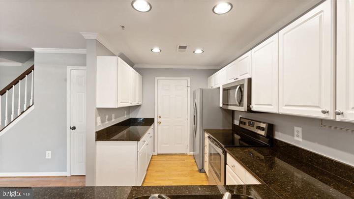 1918 Crescent Park Drive Reston, VA 20190 - Photo 11 of 33 Modern kitchen with sleek finishes.