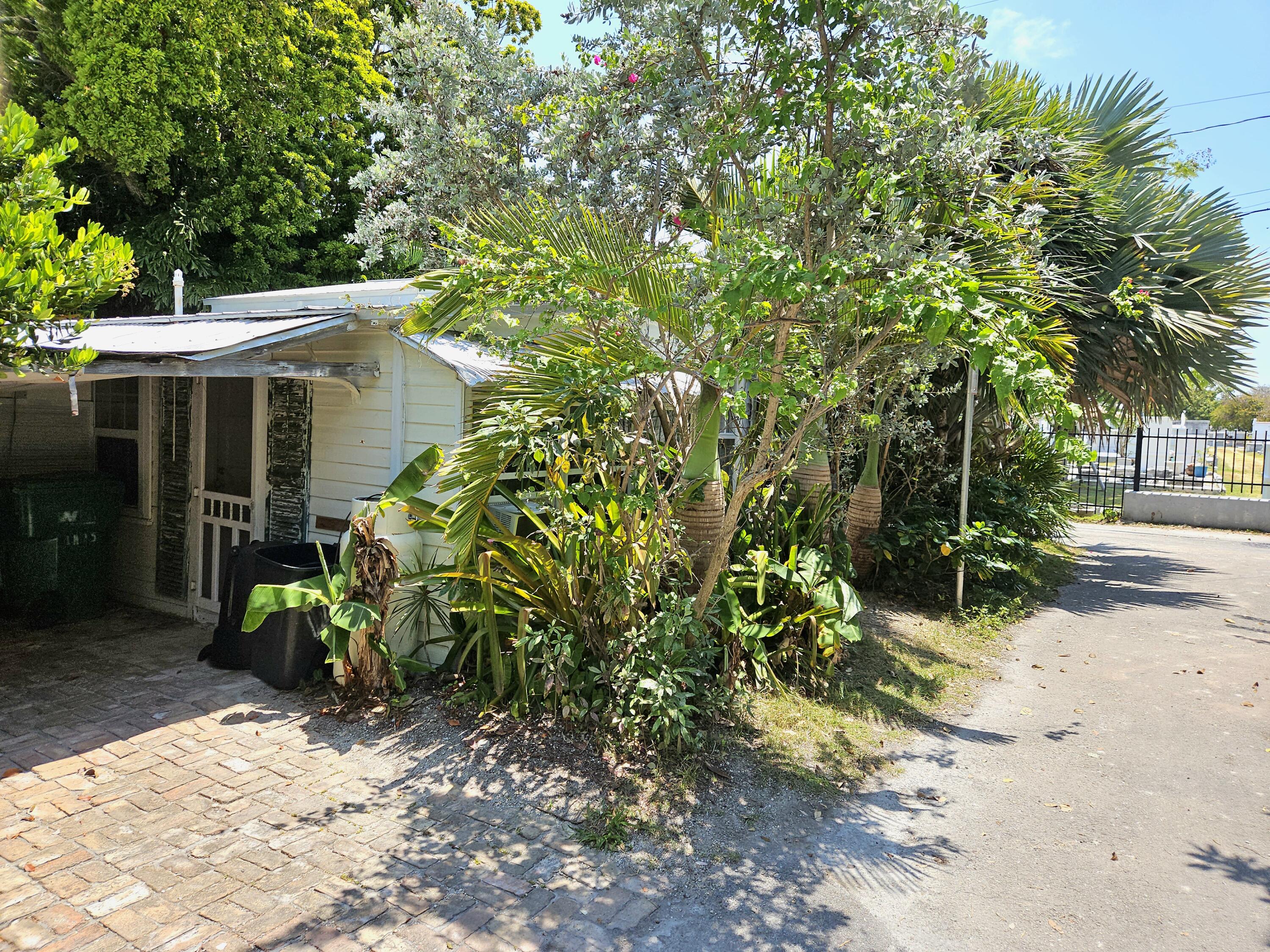 1015 Angela Street Key West, FL 33040 - Photo 13 of 42 a view of a house with a tree