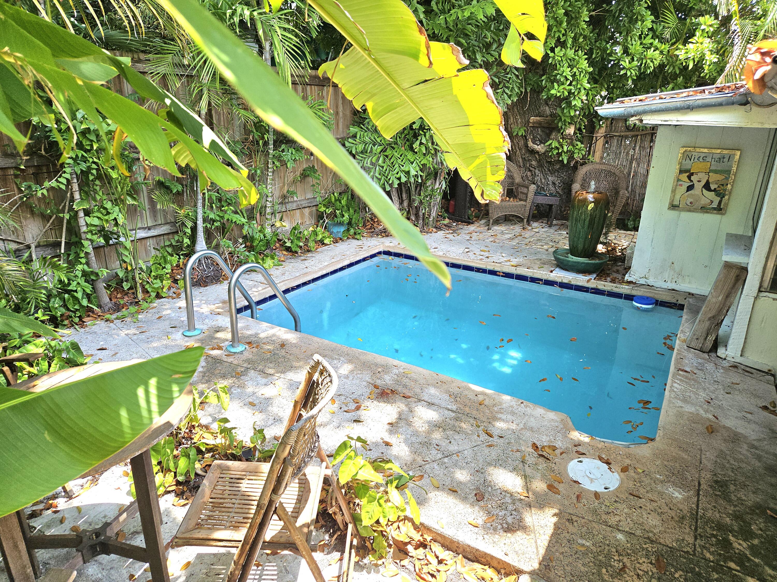 1015 Angela Street Key West, FL 33040 - Photo 15 of 42 a view of swimming pool with a patio