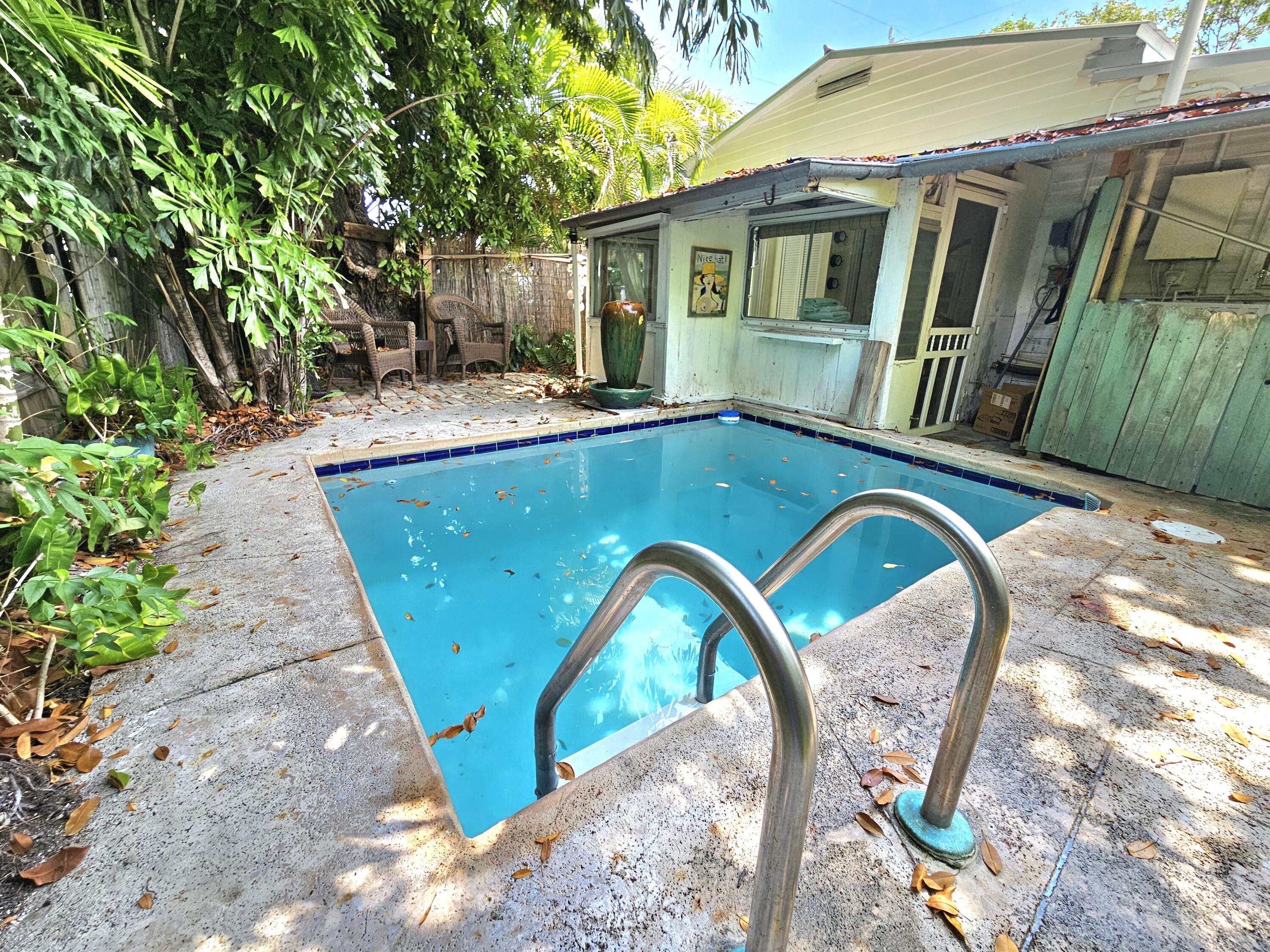 1015 Angela Street Key West, FL 33040 - Photo 17 of 42 a view of outdoor space and deck
