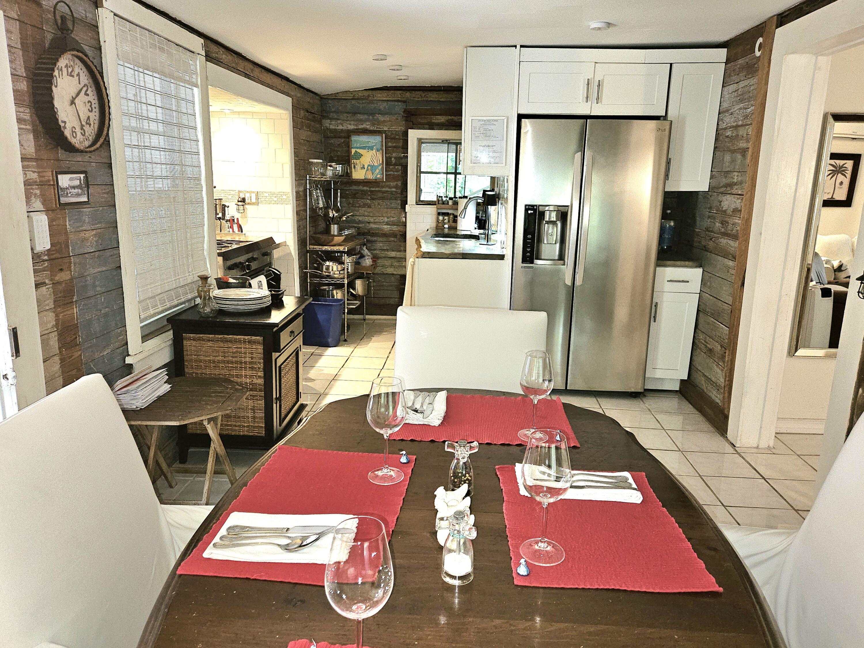 1015 Angela Street Key West, FL 33040 - Photo 29 of 42 a room with furniture and a table